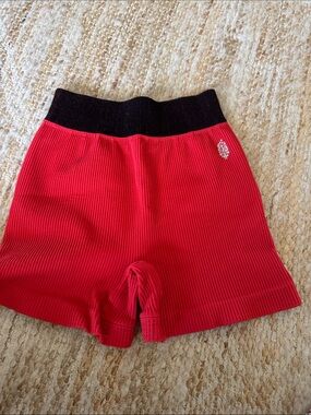 FP Movement by Free People  Ribbed Red Shorts with Black Waistband